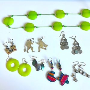 Seven funky earring and one necklace.